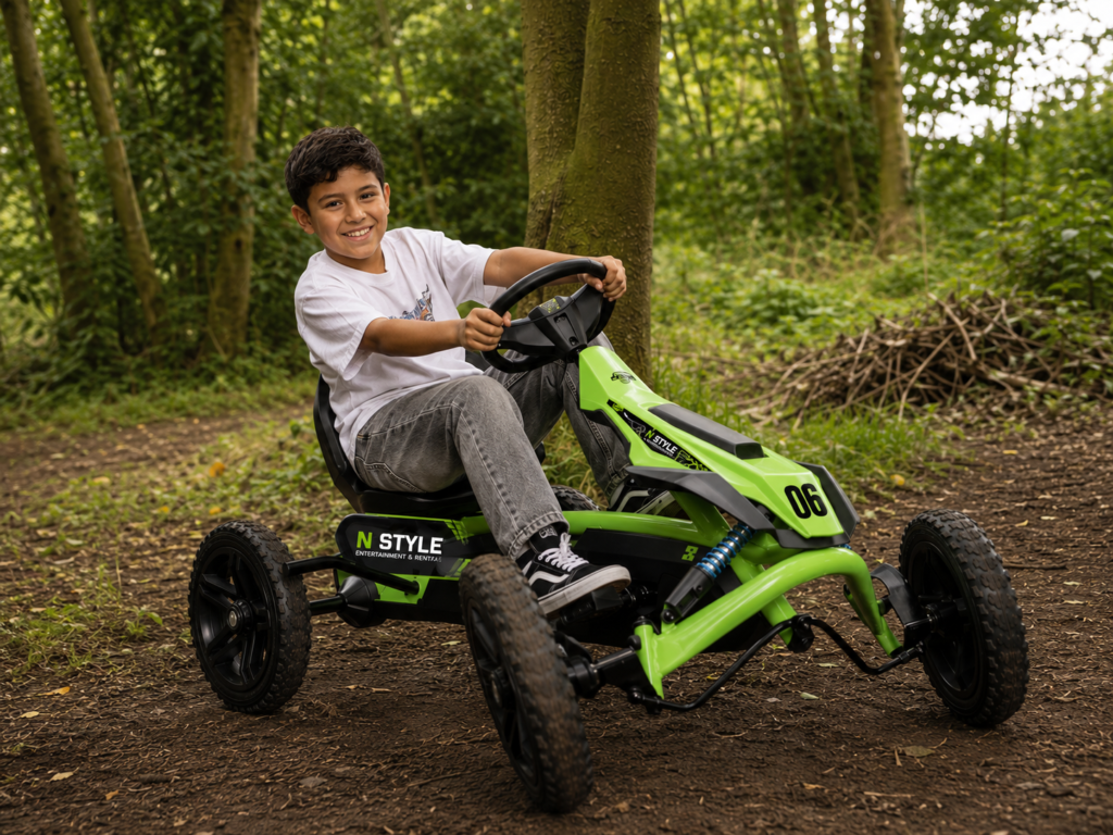 Child riding go-kart in the forest
